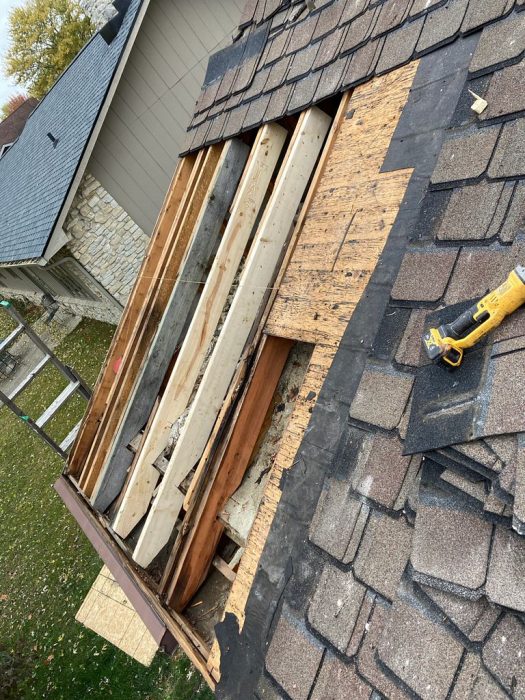 DURING: Chimney removal and roof repair