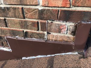 BEFORE: Chimney flashing repair